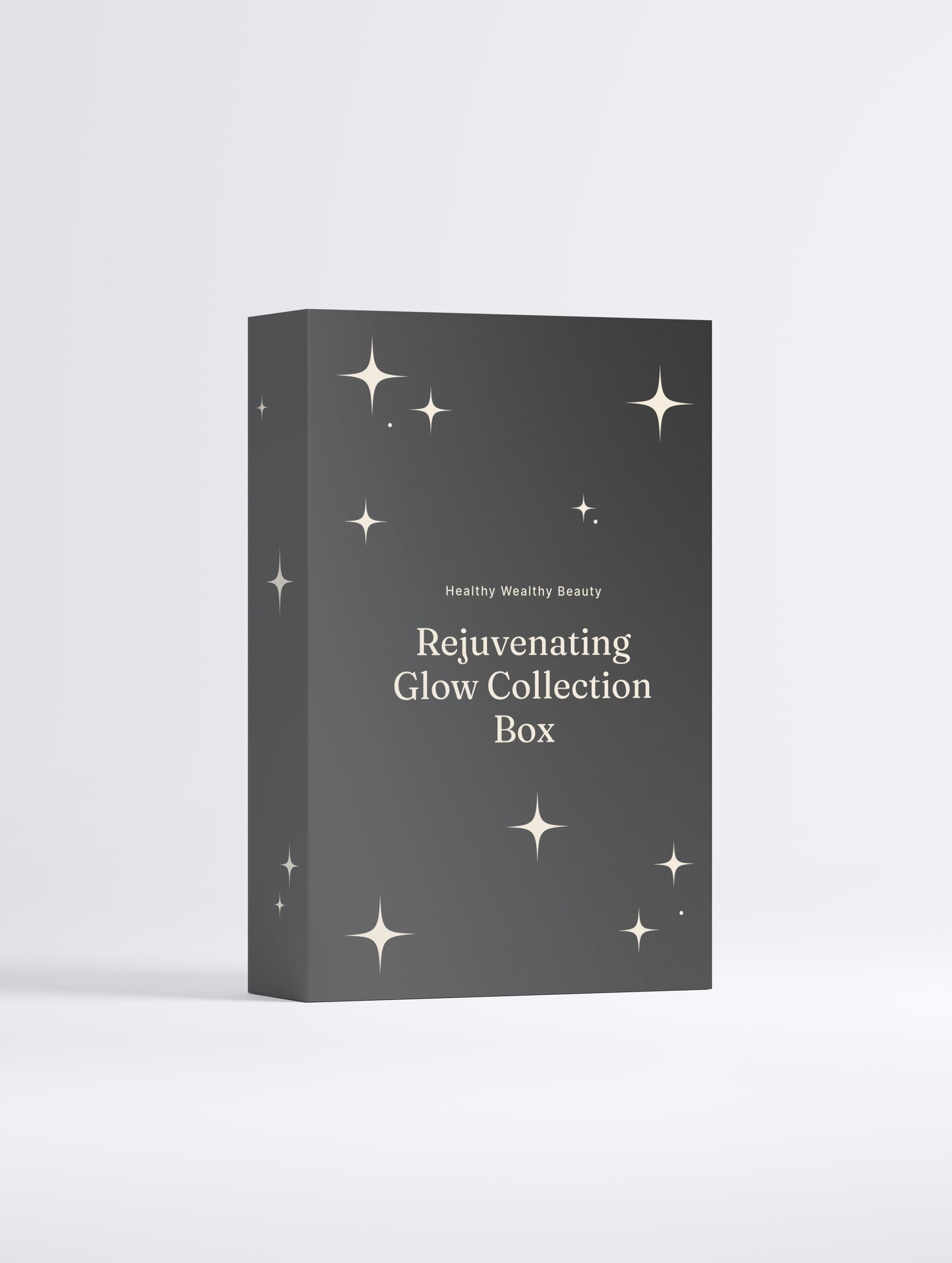 Rejuvenating Glow Collection Box in sleek black packaging with stars and brand name.