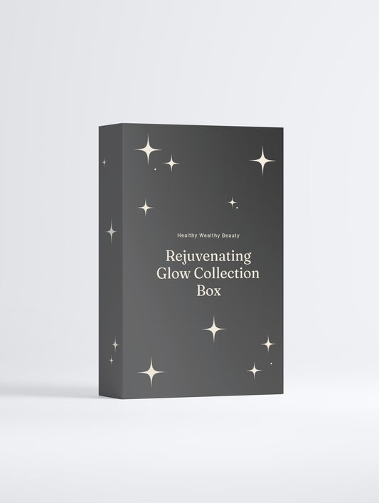 Rejuvenating Glow Collection Box in sleek black packaging with stars and brand name.