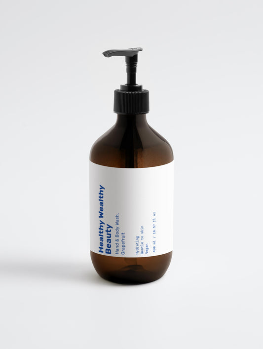 Amber bottle of grapefruit hand and body wash with hydrating, gentle formula for all skin types.