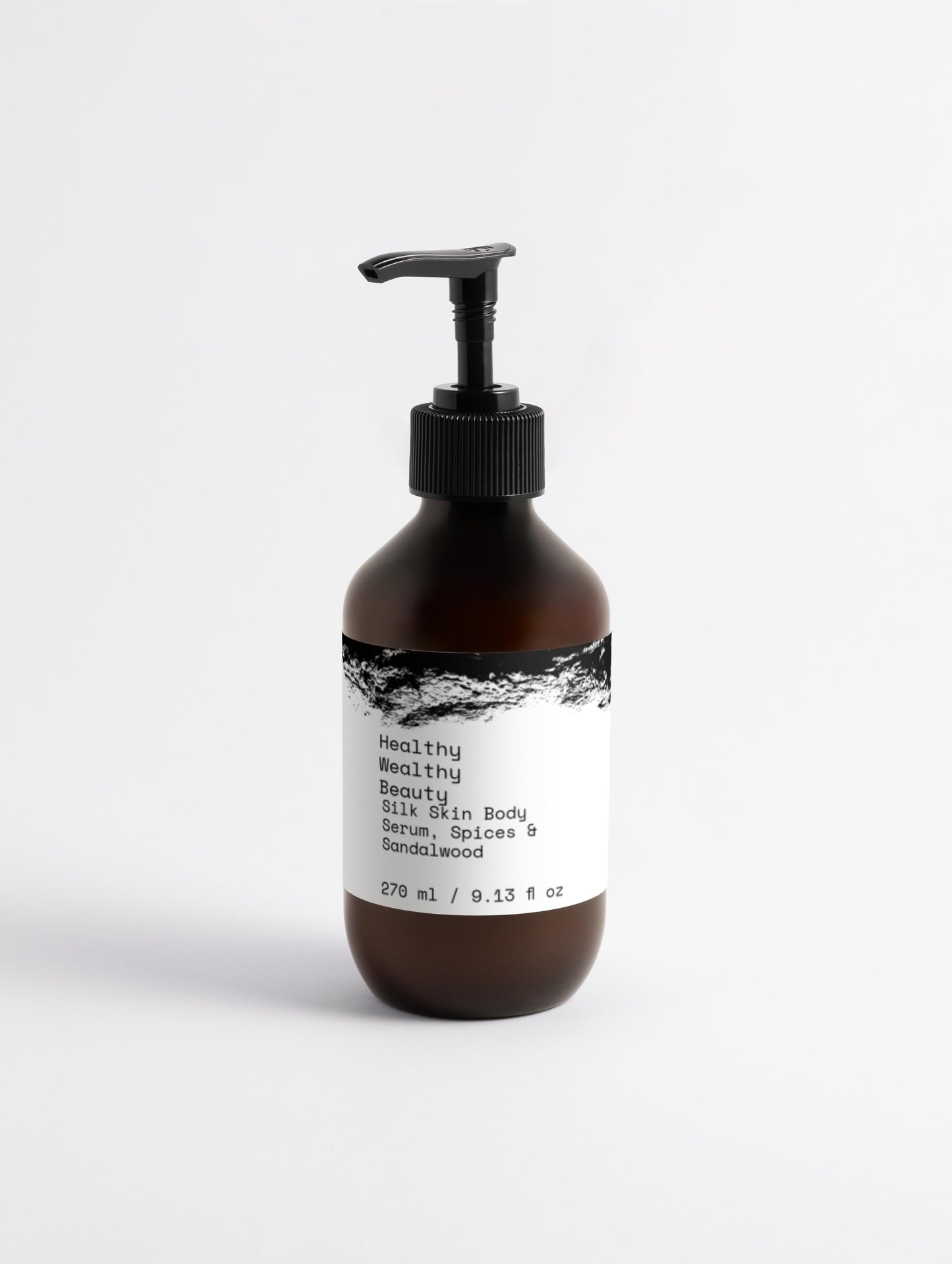 Silk Skin Body Serum with Spices & Sandalwood in a 270 ml pump bottle.